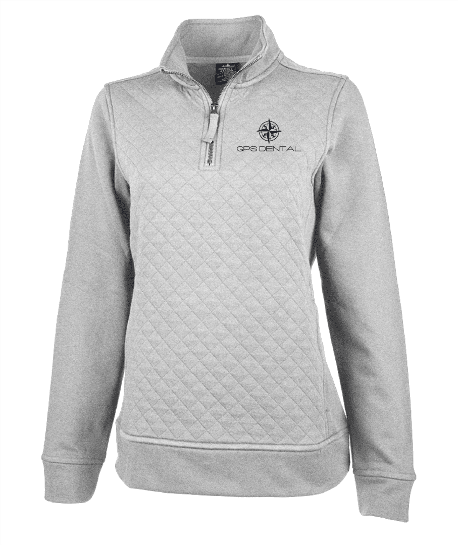 A women 's quilted 1 / 4 zip pullover with the words " grace upon grace ".