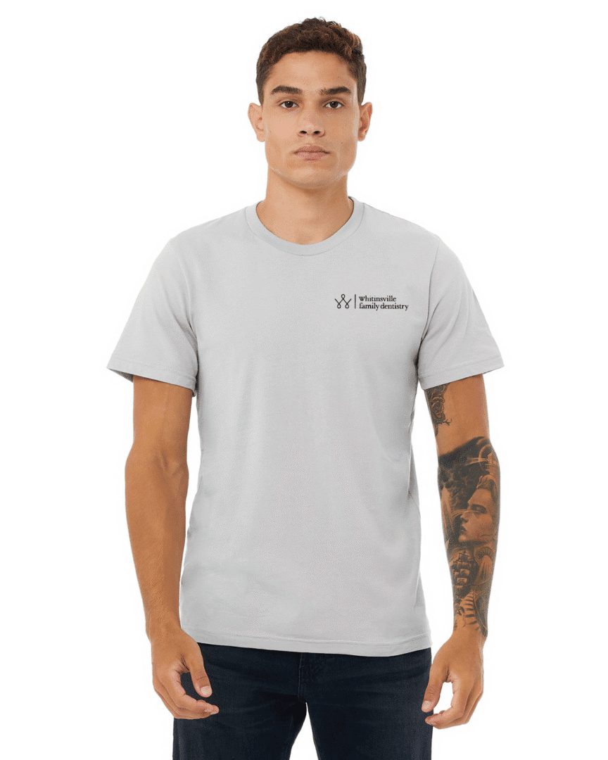Man wearing a light gray t-shirt.